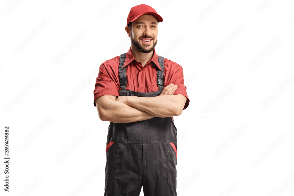 Male worker in a uniform posing with crossed arms Male worker in a uniform posing with crossed arms