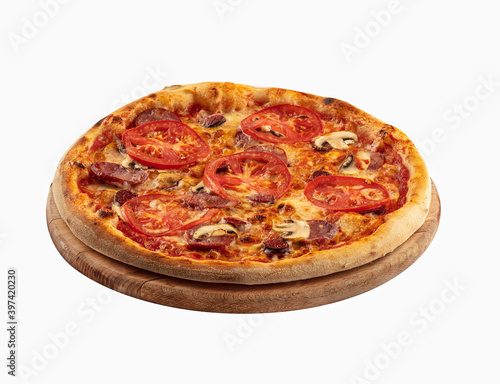 Freshly baked pizza with salami, onion rings and sliced pickles on a wooden board isolated on white background. Front view at an angle.