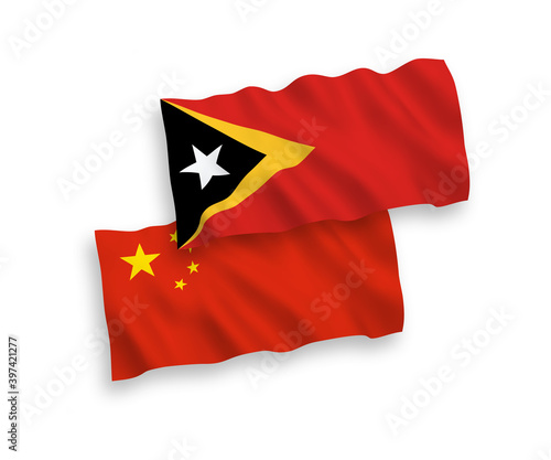 National vector fabric wave flags of East Timor and China isolated on white background 1 to 2 proportion.