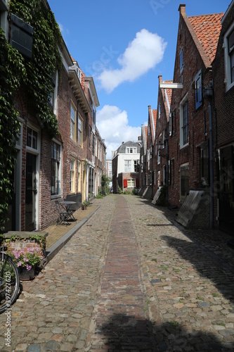 street in the town with lovely brick houses, middelburg, netherlands