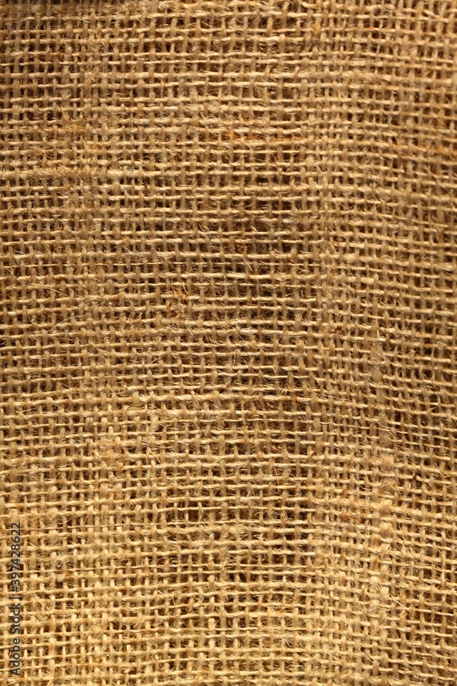 Sackcloth burlap woven texture background,. Burlap background and texture with interesting light. Sackcloth burlap woven texture background,. Burlap background and texture with interesting light.