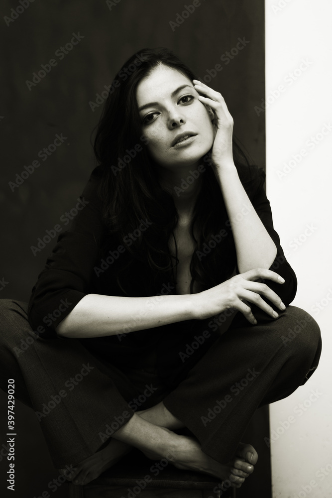Portrait of a young happy woman isolated on a blackboard. Portrait of a young happy woman isolated on a blackboard.