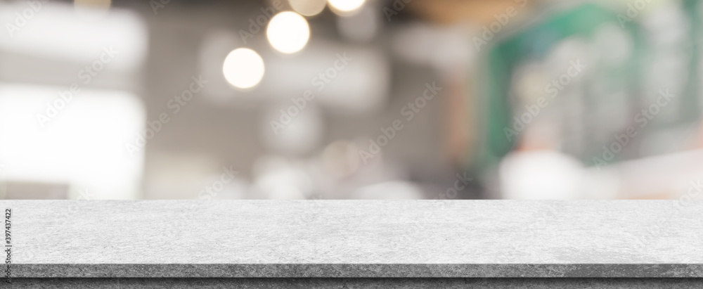 Empty white marble stone table top and blur interior cafe and restaurant. Empty white marble stone table top and blur interior cafe and restaurant.