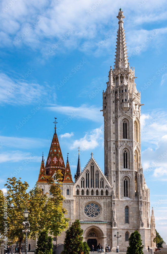 View of the 13th century St. Matthias Church with gothic bell tower in Budapest, Hungary. It is also known as Church of the Assumption of the Buda Castle, or Coronation Church of Buda