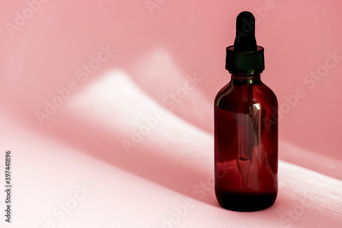 Hyaluronic acid cbd oil tincture, beauty product mockup, branding. Liquid emulsion in glass amber bottle with dropper. Serum with collagen and peptides, product advertisment. Banner, copy space photo