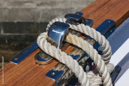 details on the deck of a marine vessel with ropes and marine tools