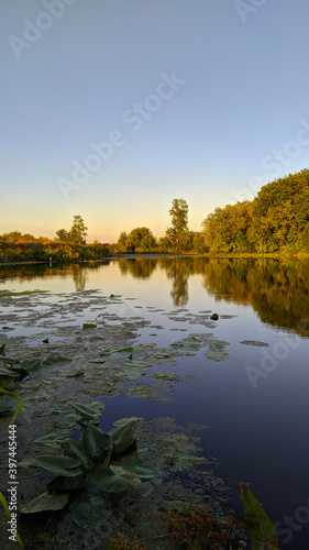 Obraz na płótnie sunset over the river w salonie