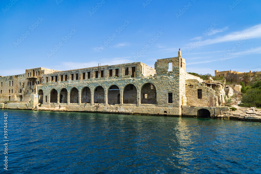 The derelict Lazzaretto (quarantine facility and hospital) at Manoel Island on the shore of Marsamxett Harbour. Gzira, Malta.