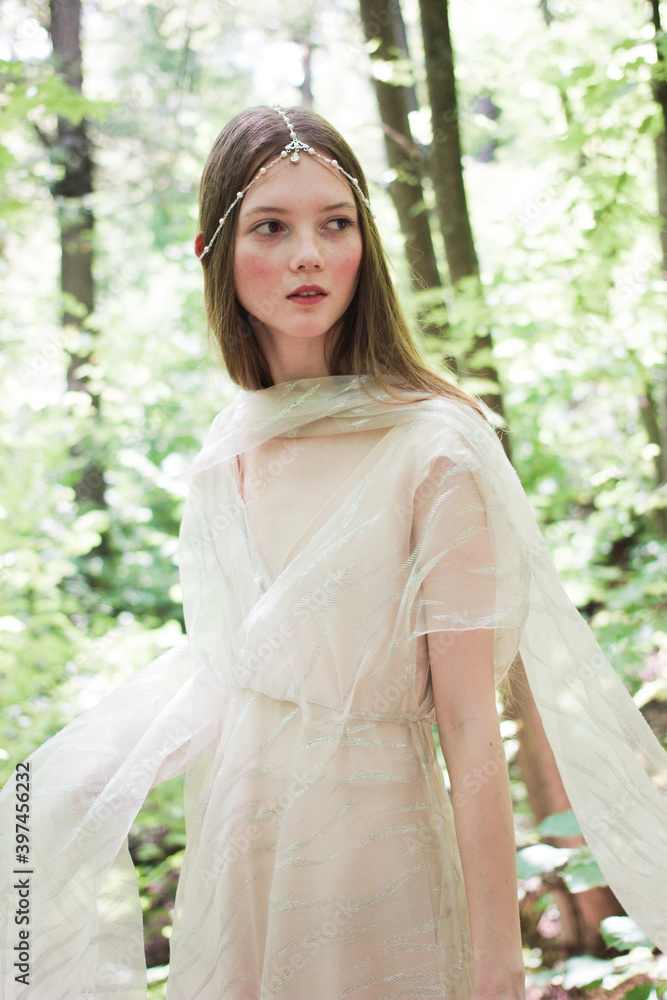 Portrait of a woman in a forest. Space for text. The concept of fashion. Magic fabulously fairytale photo.
bride in nature Portrait of a woman in a forest. Space for text. The concept of fashion. Magic fabulously fairytale photo.
bride in nature