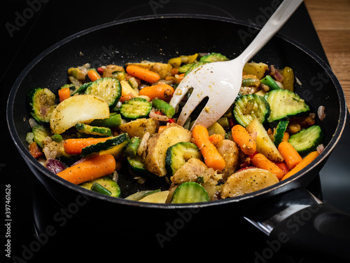 Vegetable ragout cooking in frying pan 