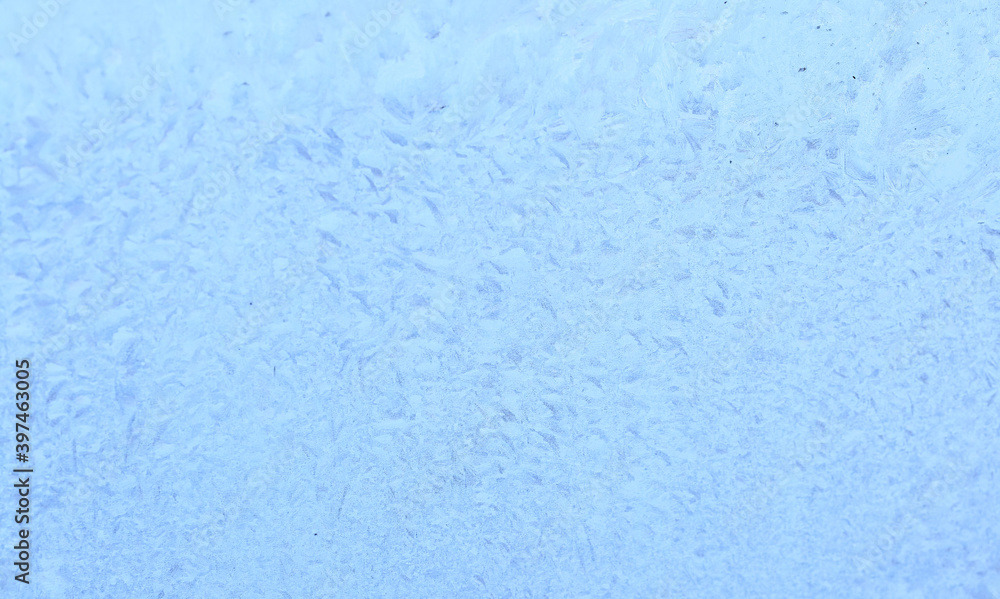 Frozen drops of condensation on a window, a sharp drop in temperature, sharply frozen drops of water on glass in winter, extremely cold low air temperatures Frozen drops of condensation on a window, a sharp drop in temperature, sharply frozen drops of water on glass in winter, extremely cold low air temperatures