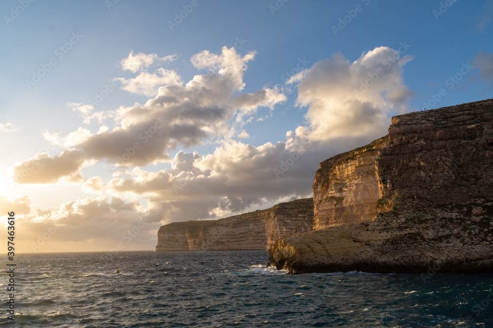 Sunsetting over Xlendi Bay in Gozo.