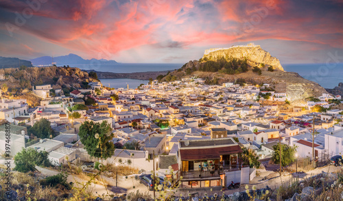 Landscape with Lindos village and castle at twilight time in Rhodes, Greece photo