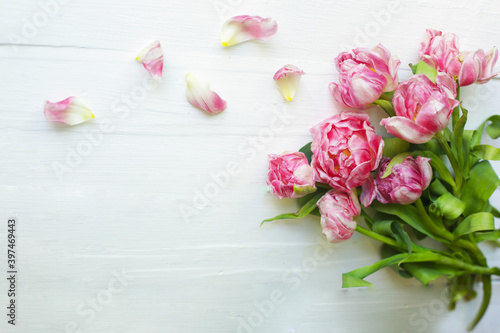Banner with pink flowers, top view on a white background. Valentine's Day. Birthday. Wedding. 