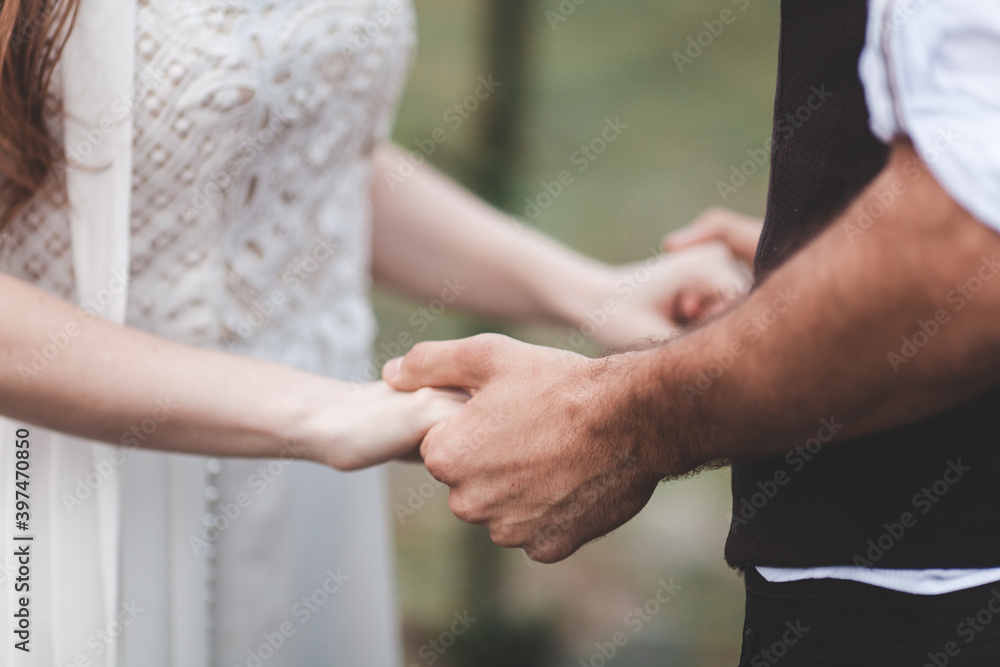 Beautiful young couple. Wedding photo session outdoors in the mountains. Happy couple. New family. Beautiful young couple. Wedding photo session outdoors in the mountains. Happy couple. New family.