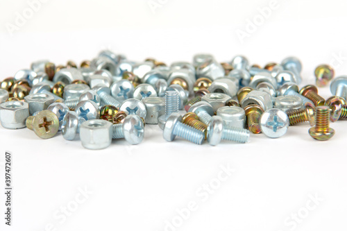 assorted bolts and nuts on a white background