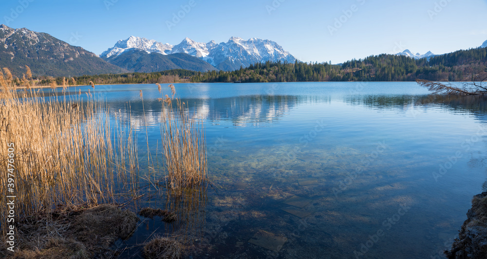 beautiful lake Barmsee, Karwendel mountains view. idyllic landscape early springtime.