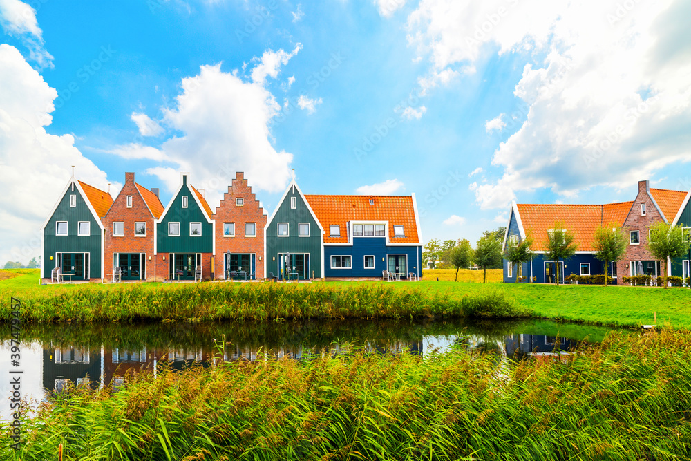 Volendam is a town in North Holland in the Netherlands. Colored houses of marine park in Volendam. Netherlands. Volendam is a town in North Holland in the Netherlands. Colored houses of marine park in Volendam. Netherlands.