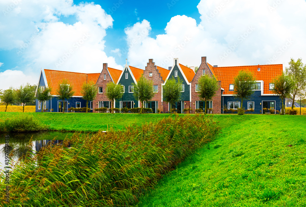 Volendam is a town in North Holland in the Netherlands. Colored houses of marine park in Volendam. Netherlands. Volendam is a town in North Holland in the Netherlands. Colored houses of marine park in Volendam. Netherlands.