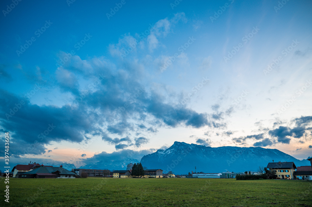 Obraz premium landscape with dramatic sky with clouds - untersberg