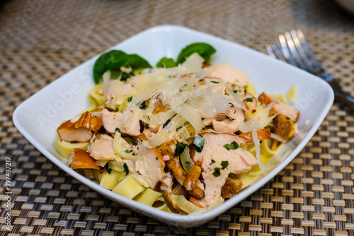 tagliatelle pasta with grilled chicken and chanterelles