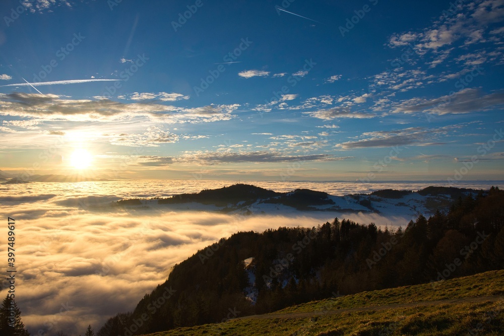 sunset over the sea of fog with a view of the hill bachtel and city zurich Photo from Alp Scheidegg, Zurich Oberland Switzerland
