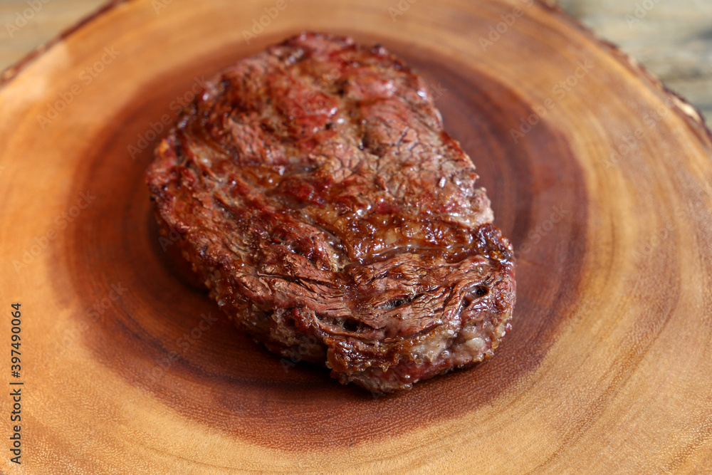 Ancho. traditional argentine cut for the barbecue. Grilled in charcoal Ancho. traditional argentine cut for the barbecue. Grilled in charcoal