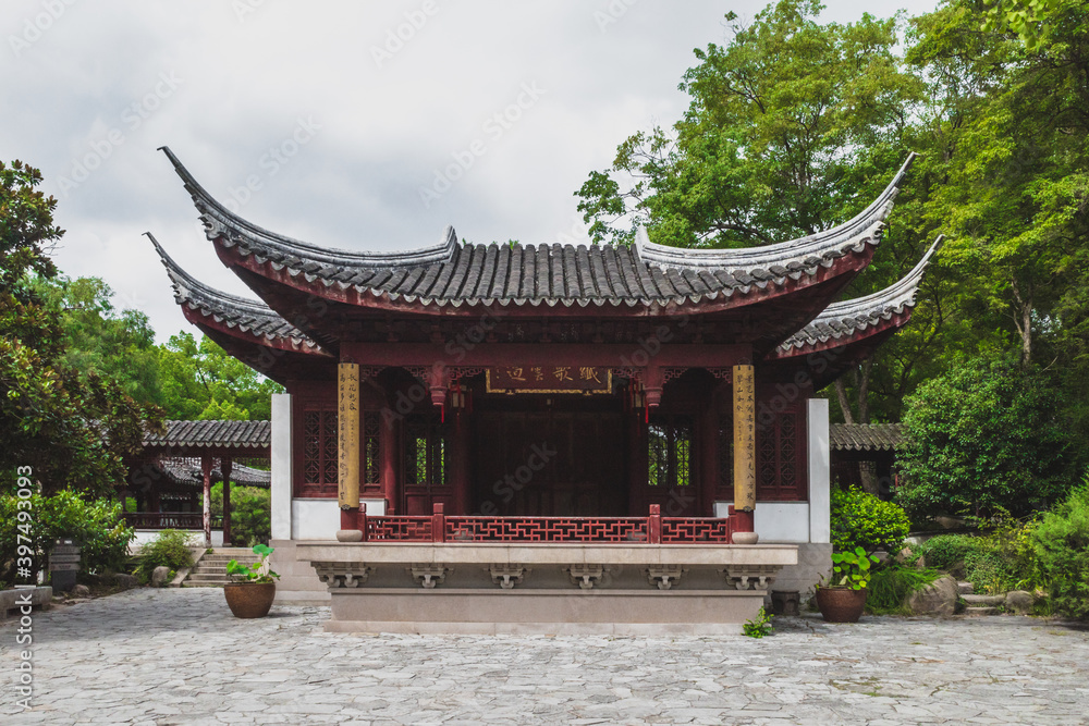 Traditional Chinese architecture among trees on Tiger Hill (Huqiu), Suzhou, Jiangsu, China Traditional Chinese architecture among trees on Tiger Hill (Huqiu), Suzhou, Jiangsu, China