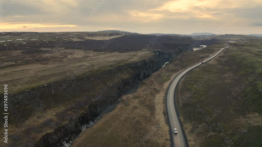 Olfusa river, Iceland. Picturesque natural landscape of volcanic terrain. Flows of river and road - view from above. High quality 4k footage Olfusa river, Iceland. Picturesque natural landscape of volcanic terrain. Flows of river and road - view from above. High quality 4k footage