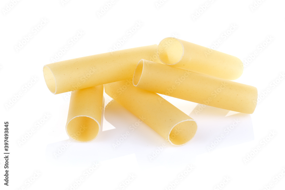 Italian pasta for tubes cannelloni. Close-up of a of raw cannelloni pasta, a tubular pasta that is usually stuffed with meat or vegetables, on a white background. Italian pasta for tubes cannelloni. Close-up of a of raw cannelloni pasta, a tubular pasta that is usually stuffed with meat or vegetables, on a white background.