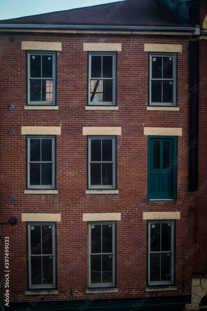 Brick Building With Door As Window