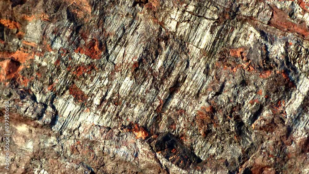 Iron ore. The unique structure of the stone wall abstract texture. Nature pattern for decoration. Background video for design. Iron ore. The unique structure of the stone wall abstract texture. Nature pattern for decoration. Background video for design.