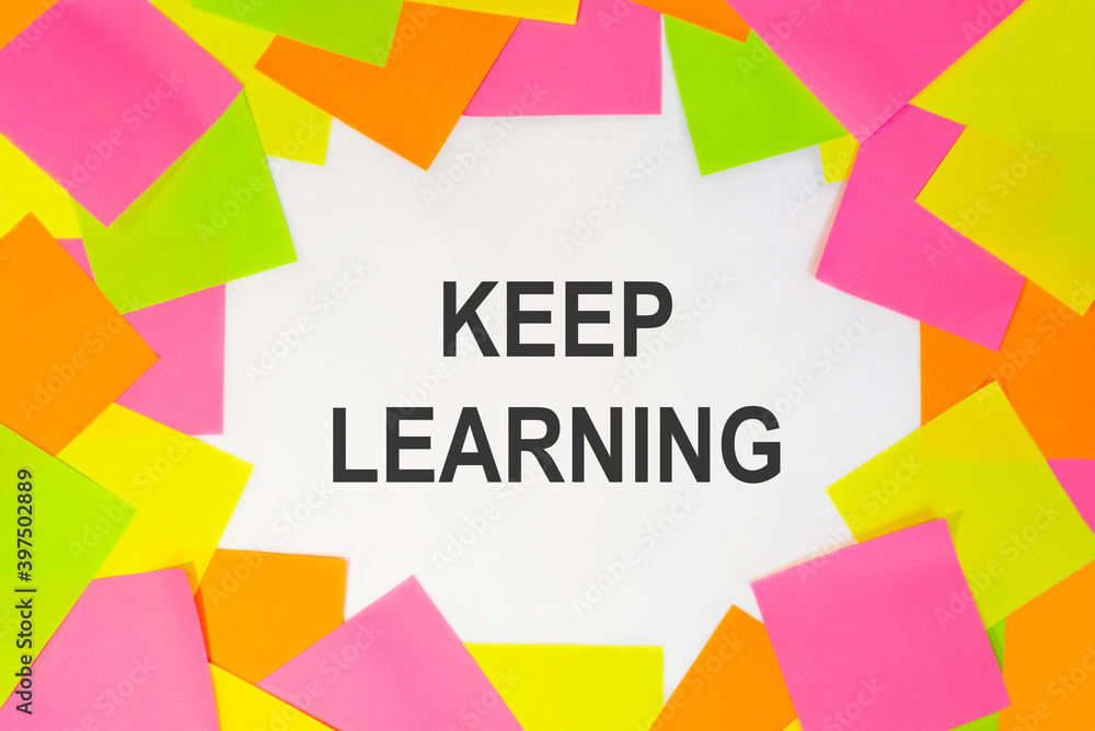 Text keep learning on a white background. Multicolored stickers around Text keep learning on a white background. Multicolored stickers around