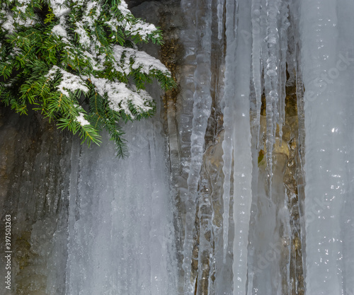 closeup frozen waterfall in the mountain canyon