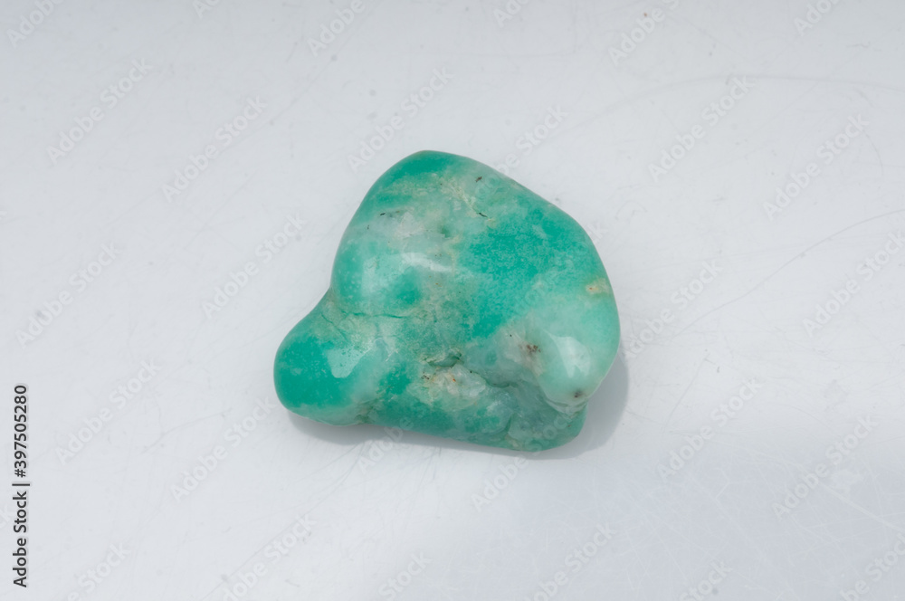 Natural chrysoprase stone on white background Natural chrysoprase stone on white background