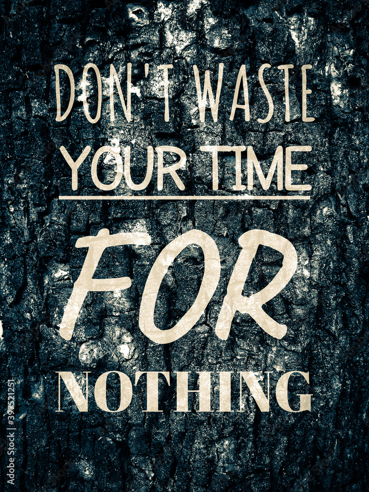 motivation and inspirational quote.Don't waste your time for nothing text on abstract dark background