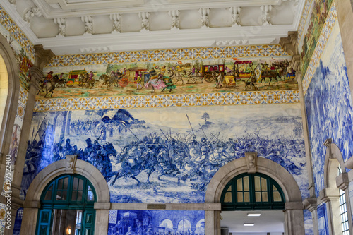 PORTO, PORTUGAL - AUGUST 12, 2017: Famous railway station Sao Bento with Azulejo panels photo