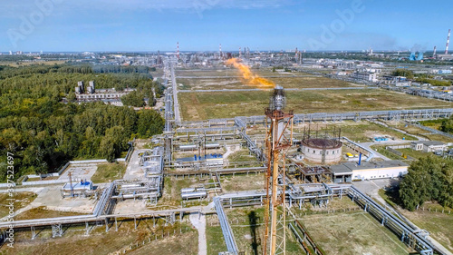 Flaring of associated gas at a petrochemical plant.