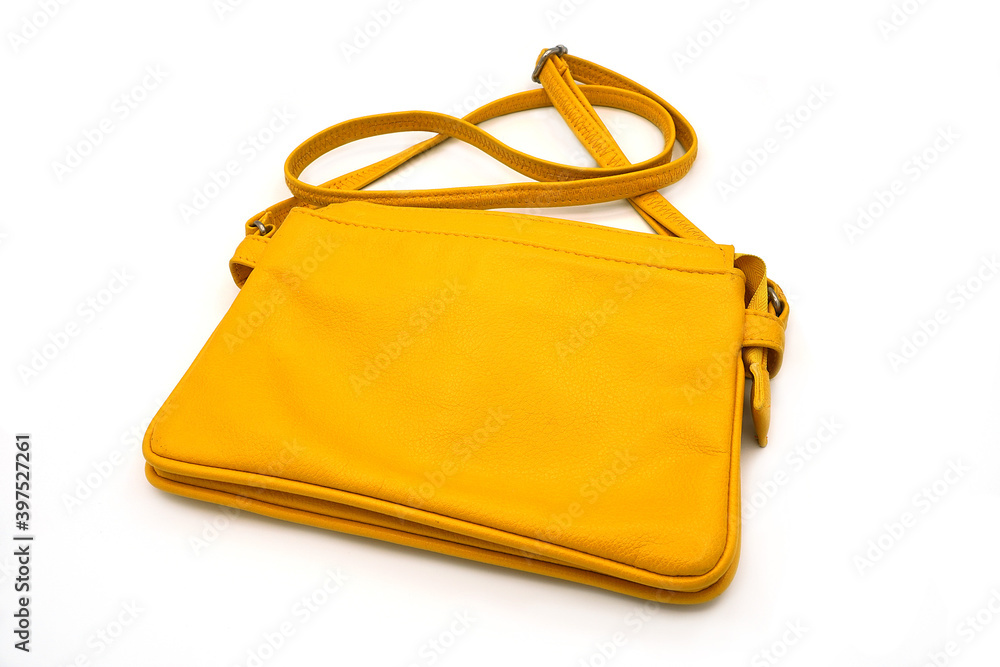 Naklejka premium yellow bag isolated on white