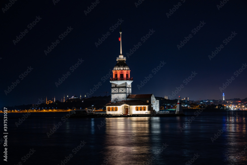 Maiden's Tower at night.Most famous tower in istanbul with city light background 