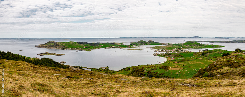 A view on Fjoloy and Klosteroy islands from top of Mastravarden hill on Mosteroy, Norway, May 2018