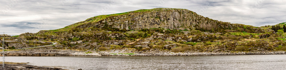 A panoramic view to Fjoloy island coastline and highest peak, Rennesoy kommune, Stavanger, Norway, May 2018