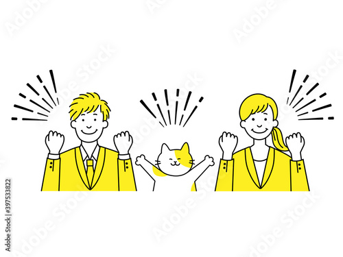 ガッツポーズする男女と猫