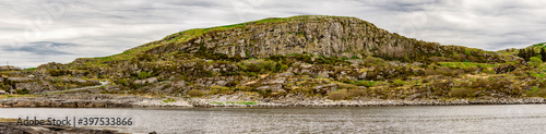 Obraz na płótnie A panoramic view to Fjoloy island coastline and highest peak, Rennesoy kommune, Stavanger, Norway, May 2018 w salonie