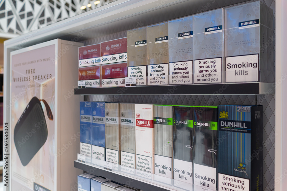 Various brands of tobacco on store shelves in Hamad International