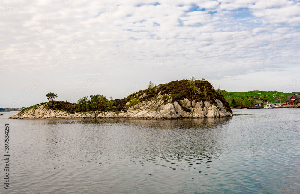 A small scenic island between Sokn and Mosteroy islands, Rennesoy commune, Stavanger, Norway, May 2018