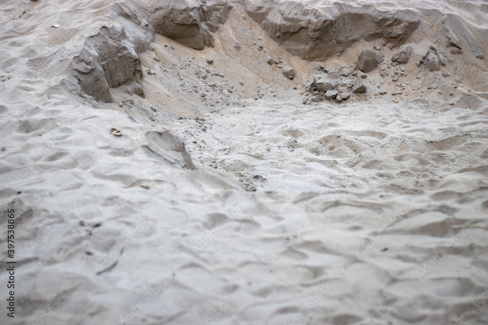 unrefined white sand land near a river close up shot unrefined white sand land near a river close up shot