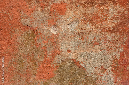 Old orange-brown wall textured background.