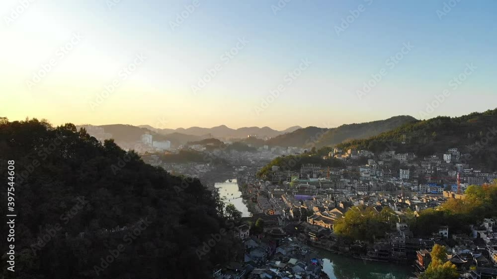 aerial view flying a drone of Fenghuang ancient town. Fenghuang old town Phoenix ancient town or Fenghuang County is a county of Hunan Province, China. aerial view flying a drone of Fenghuang ancient town. Fenghuang old town Phoenix ancient town or Fenghuang County is a county of Hunan Province, China.