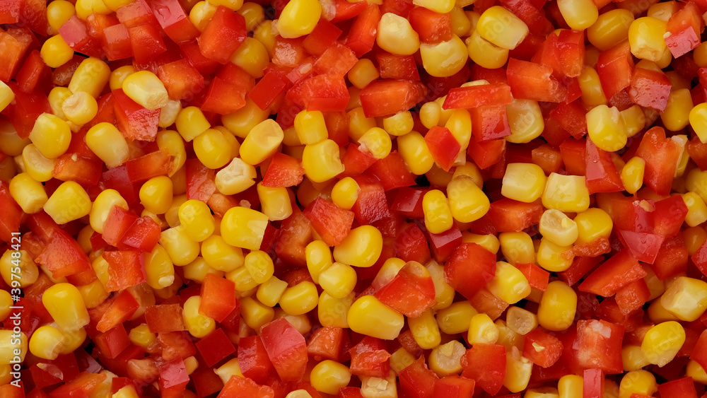 mixed vegetables chopped paprika pepper and canned corn. frozen vegetables top view mixed vegetables chopped paprika pepper and canned corn. frozen vegetables top view